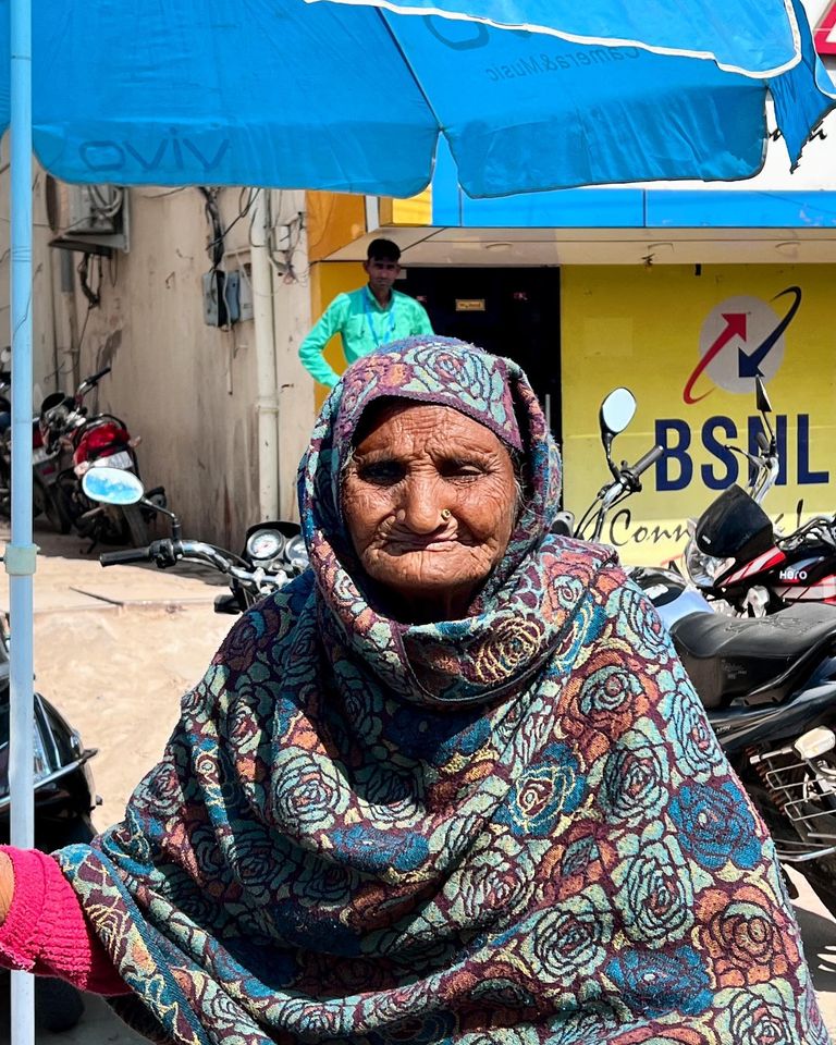 Suri begs for food and is helped by a Baba's Feed Project kit
